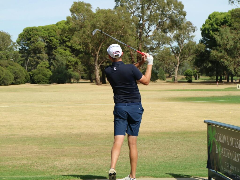 A man playing golf