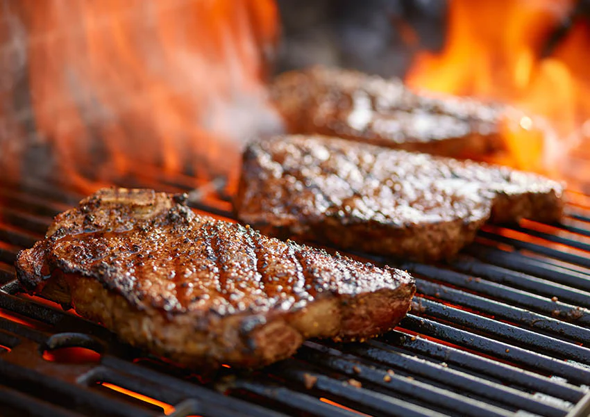 Steaks on a BBQ